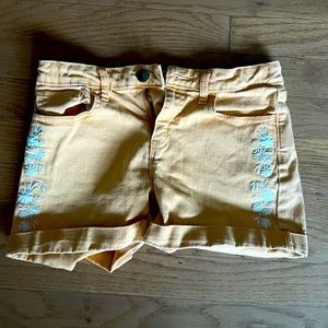 Orange embroidered jean shorts!
